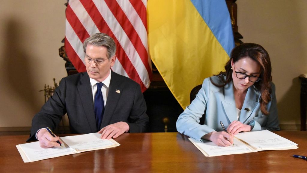 Scott Bessent and Yuliia Svyrydenko signing trade agreement